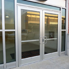 Entrée extérieure articulée en verre en aluminium commerciale Front Doors de magasin de portes